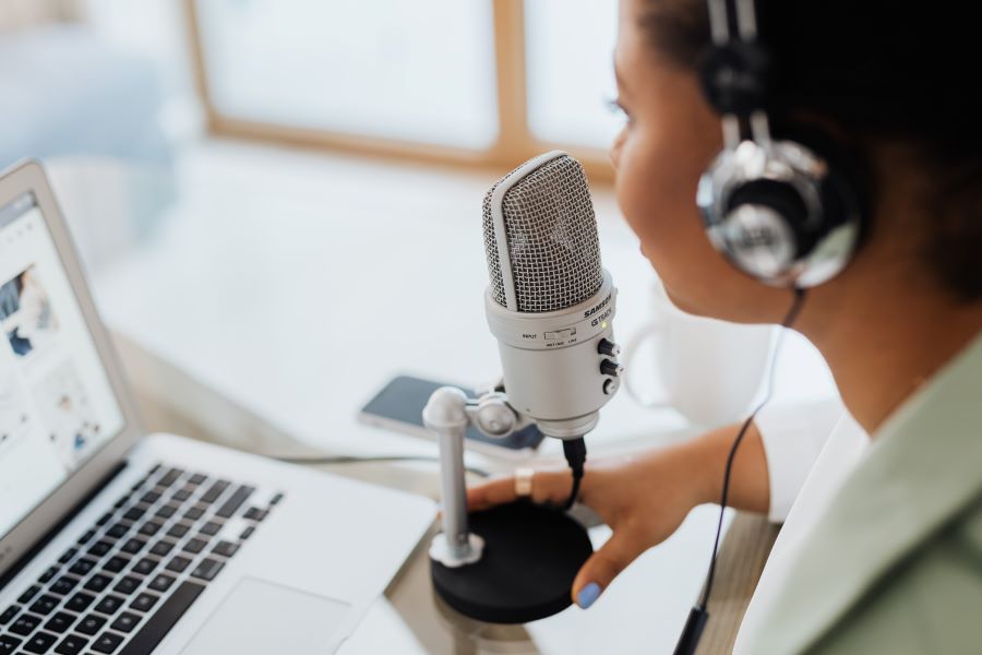 What is the Purpose of a Podcast? 1 podcasting in a laptop